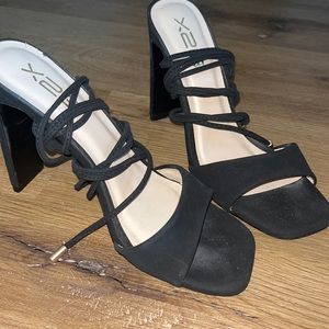 Black strap heels. Size 7